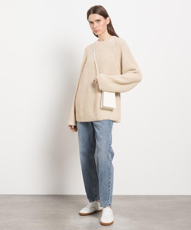 Opa-Pulli mit Jeans kombinieren